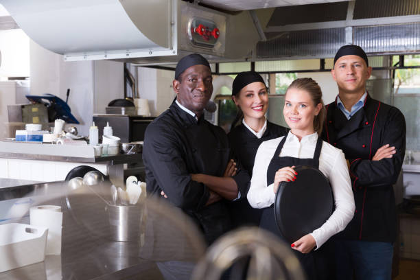 istock Group of chefs in kitchen of restaurant 1143236151