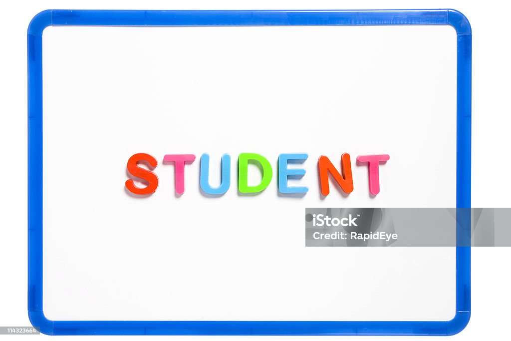 STUDENT spelled out in kids' letters The word "student" spelled out in plastic magnetic letters on a white background, a magnetic whiteboard. Not isolated as such, but easily done if you need to. Camera: Canon EOS 1Ds Mark III. Blue Stock Photo