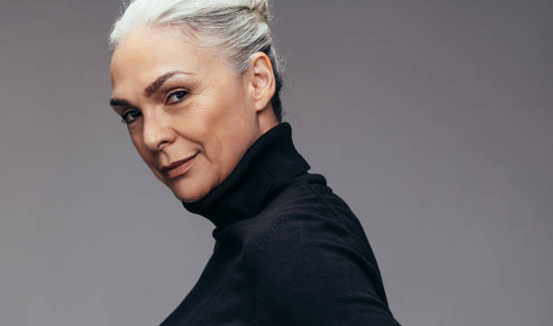 istock Beautiful mature woman in staring at camera 1143239252