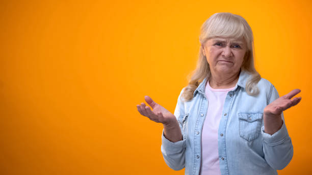 Unhappy retiree female showing disappointment gesture, consumer rights violation