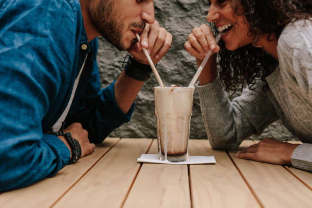 istock Loving couple having a cold coffee 1143240024