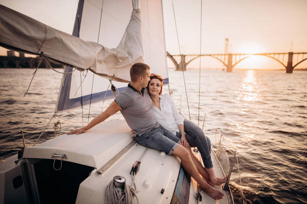 istock Romantic couple on yacht at sunset 1143241417