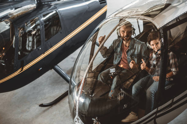 istock Cheerful male and boy in rotor plane 1143244539
