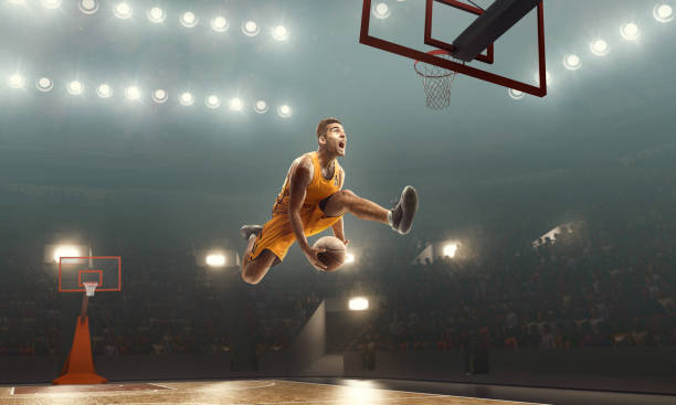istock Basketball player makes jump shot. Slam Dunk 1143245363