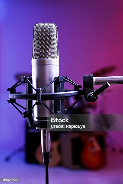 Recording Microphone With Band Instruments Stock Photo - Download Image Now - Electricity, Guitar, Pink Color