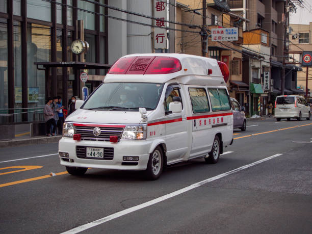 Ambulance driving downtown, Kyoto, Japan stock photo