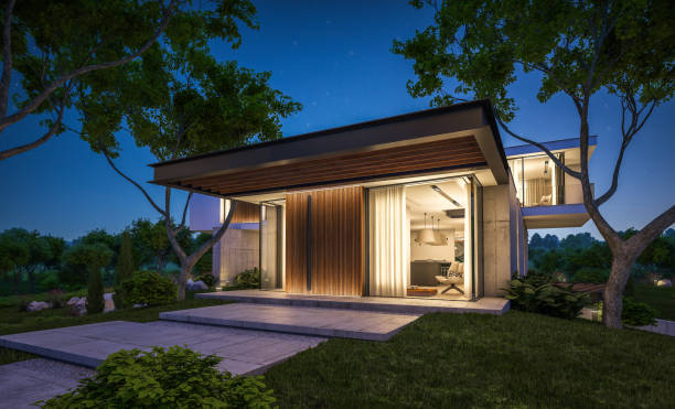 istock 3d rendering of modern house on the hill with pool in night 1143249374