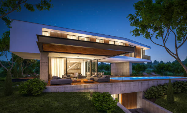 istock 3d rendering of modern house on the hill with pool in night 1143249382