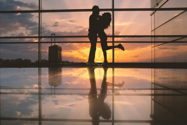 istock Positive man embracing cheerful lady 1143249980