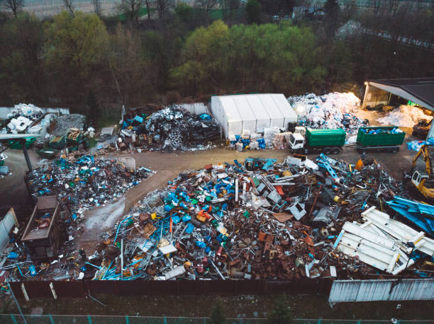 istock Piles of garbage at waste disposal dump 1143250579
