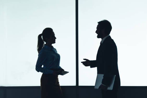 istock Cheerful employers telling during job 1143253441