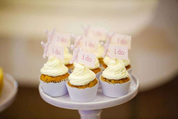 istock close up with delicious cupcakes with message I do 1143256866