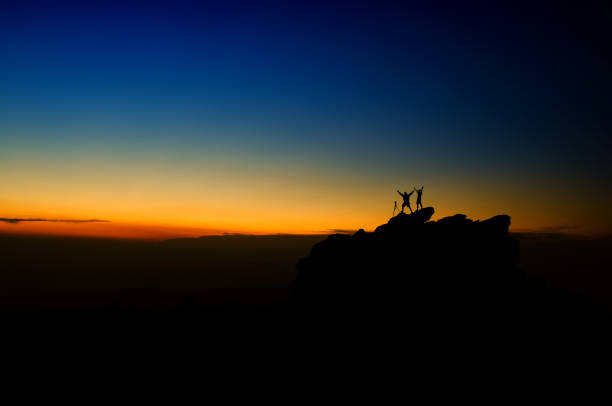 istock Photographer silhouette at sunset 1143257616