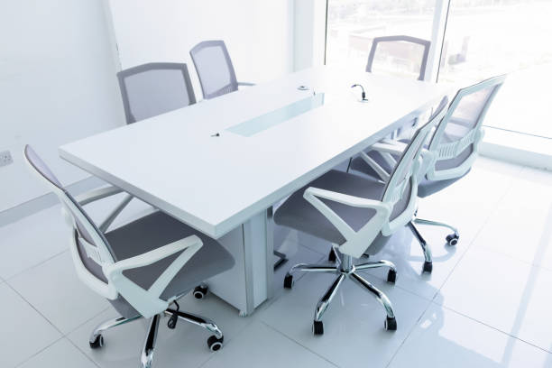 istock Empty new meeting room with magnificent view from the window. Office chairs and conference table in the office. Business or office work concept. 1143258237