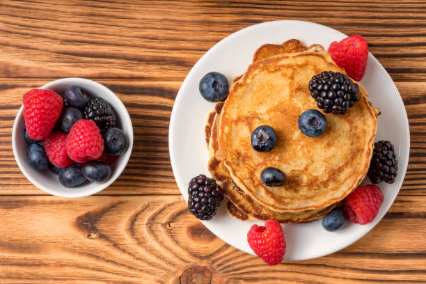 istock Top view of Pancakes with berries 1143258632