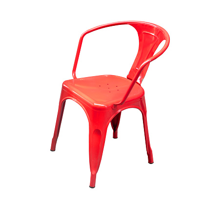 Red modern plastic chair isolated on a white background.