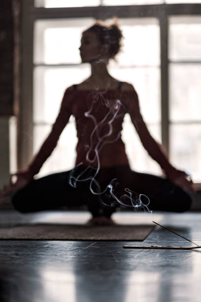 istock Blurred woman practicing yoga in Toe Balance 1143259634