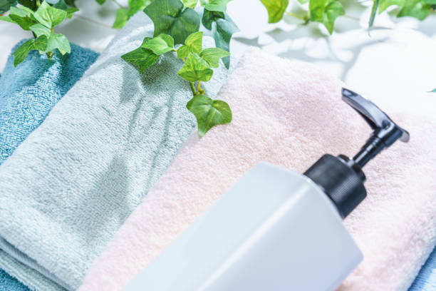 istock Stack of clean towels on wooden background 1143260033