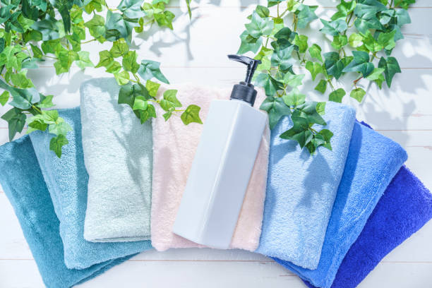 istock Stack of clean towels on wooden background 1143260071