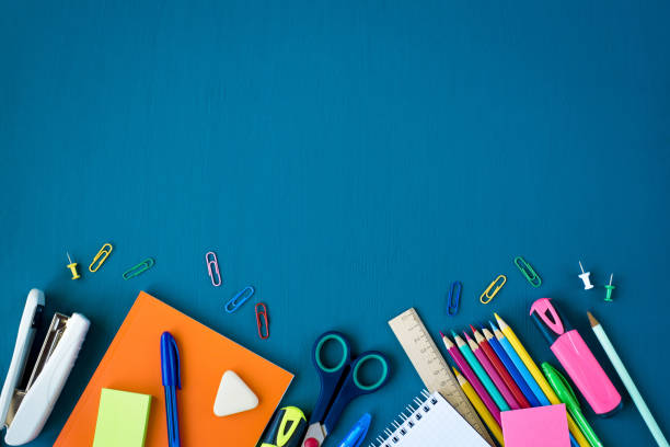 istock School supplies on blue background 1143261406