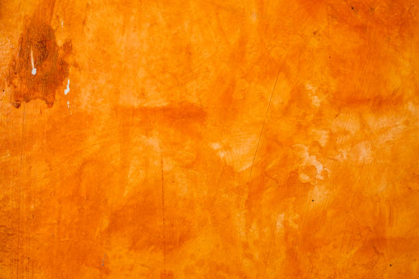 istock Textured wall brushed painted Background, Abstract Orange Oil Color. 1143264605