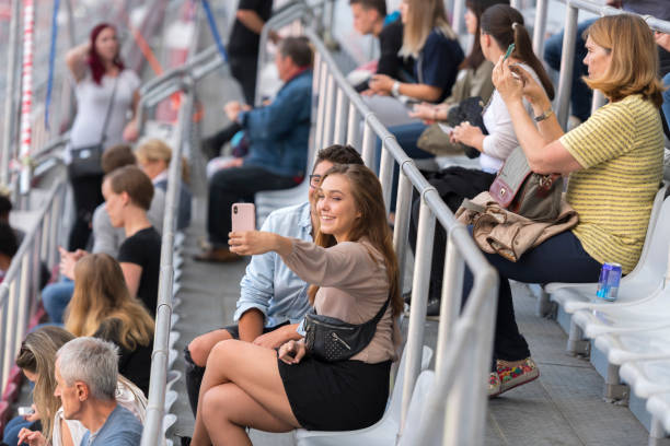 istock Spectators taking selfie with smart phone 1143265450