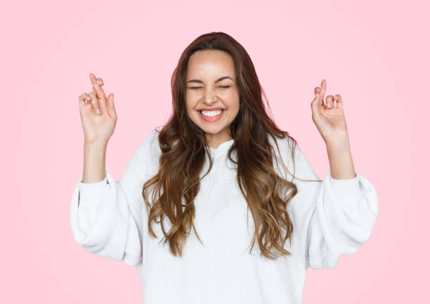 istock Excited girl making wish happily 1143265982