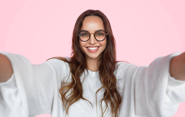 istock Excited female taking selfie 1143265994