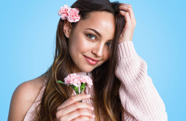 istock Beautiful romantic girl with flowers 1143266022