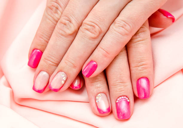 istock Woman's nails with beautiful manicure fashion design 1143266207