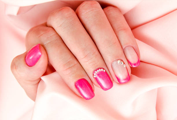 istock Woman's nails with beautiful manicure fashion design 1143266227