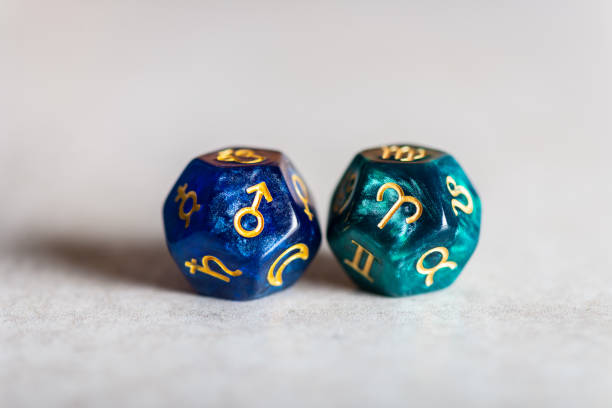istock Astrology Dice with zodiac symbol of Aries and its ruling planet Mars 1143267708