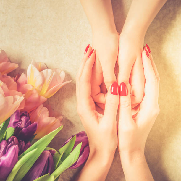 istock Mother is holding her kids hands, mothers day or relationship concept 1143268585