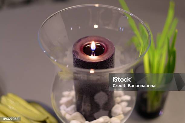 Decorative Candle In A Transparent Glass Vase Stock Photo - Download Image Now - Brown, Candle, Decoration