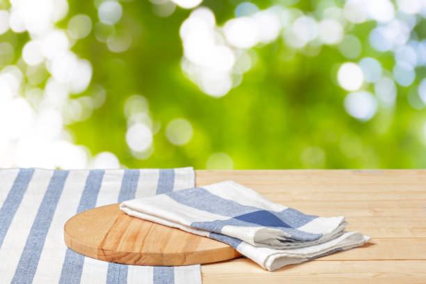 Background with tablecloth on wooden table