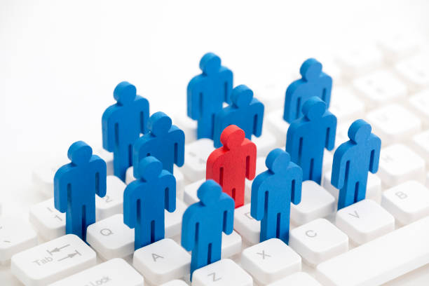 istock Unique person in the crowd on computer keyboard 1143275511
