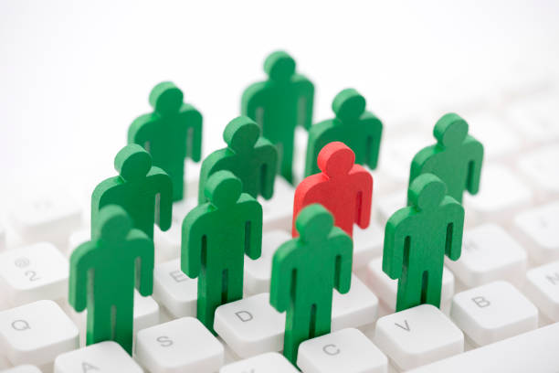 istock Unique person in the crowd on computer keyboard 1143275529