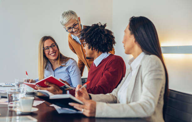 istock Multi-ethnic group of colleagues at meeting 1143277247