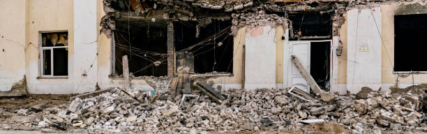 istock destroyed ruined house in the war and bricks laying around b 1143278388