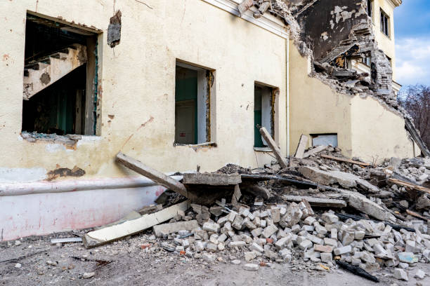istock destroyed ruined house in the war and bricks laying around b 1143278398