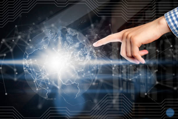 istock man point at 3d earth gloge hologram b 1143278479