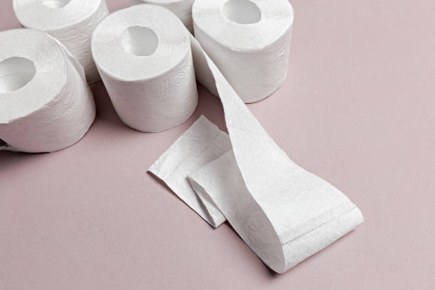istock Toilet paper on pink background 1143279508