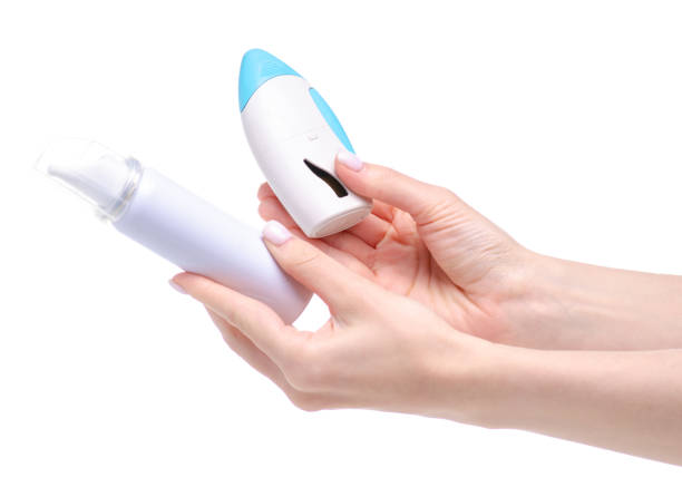 istock White bottles nose spray in hand 1143280276