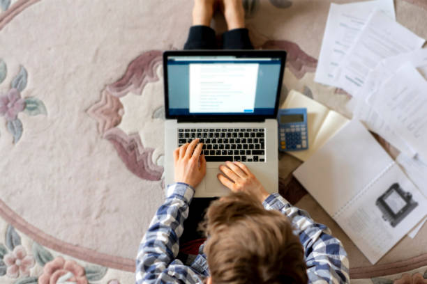 young man with laptop making startup at home b - child office chaos computer monitor imagens e fotografias de stock