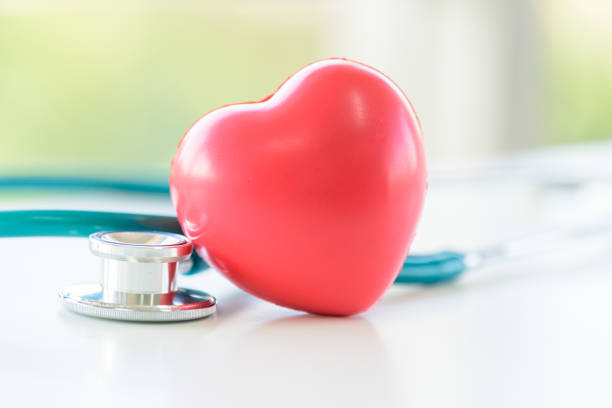 istock Red heart and stethoscope with window background in the morning. 1143282059