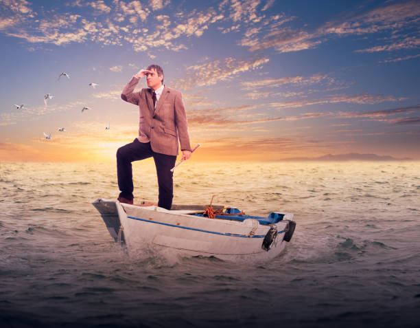 istock businessman standing on a boat 1143284997