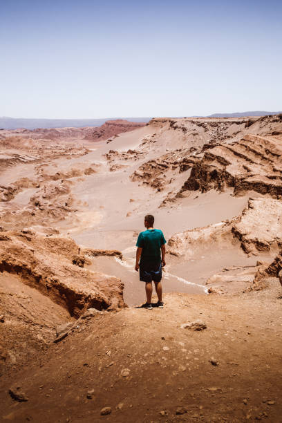 istock Man at beautiful canyon in Atacama desert 1143286856