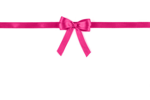 istock Shiny pink silk ribbon on white background. 1143288121