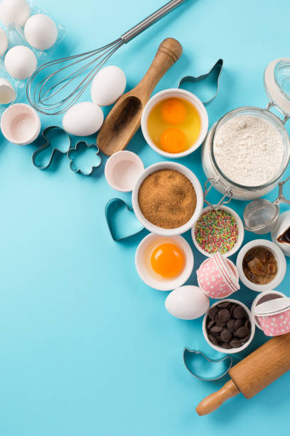 istock Ingredients and utensils for baking, blue background 1143288412