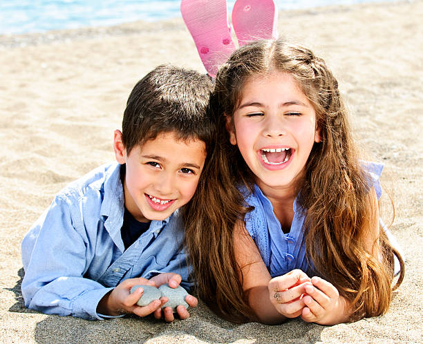 istock Brother and sister at beach 114329141
